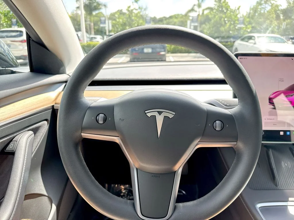 Used 2023 Solid Black Tesla  image 48