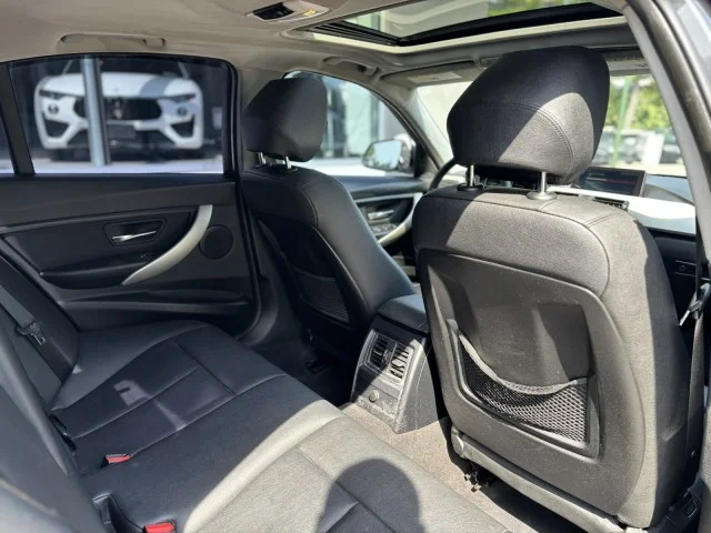 Used 2018 Mineral Gray Metallic BMW 320i xDrive image 12
