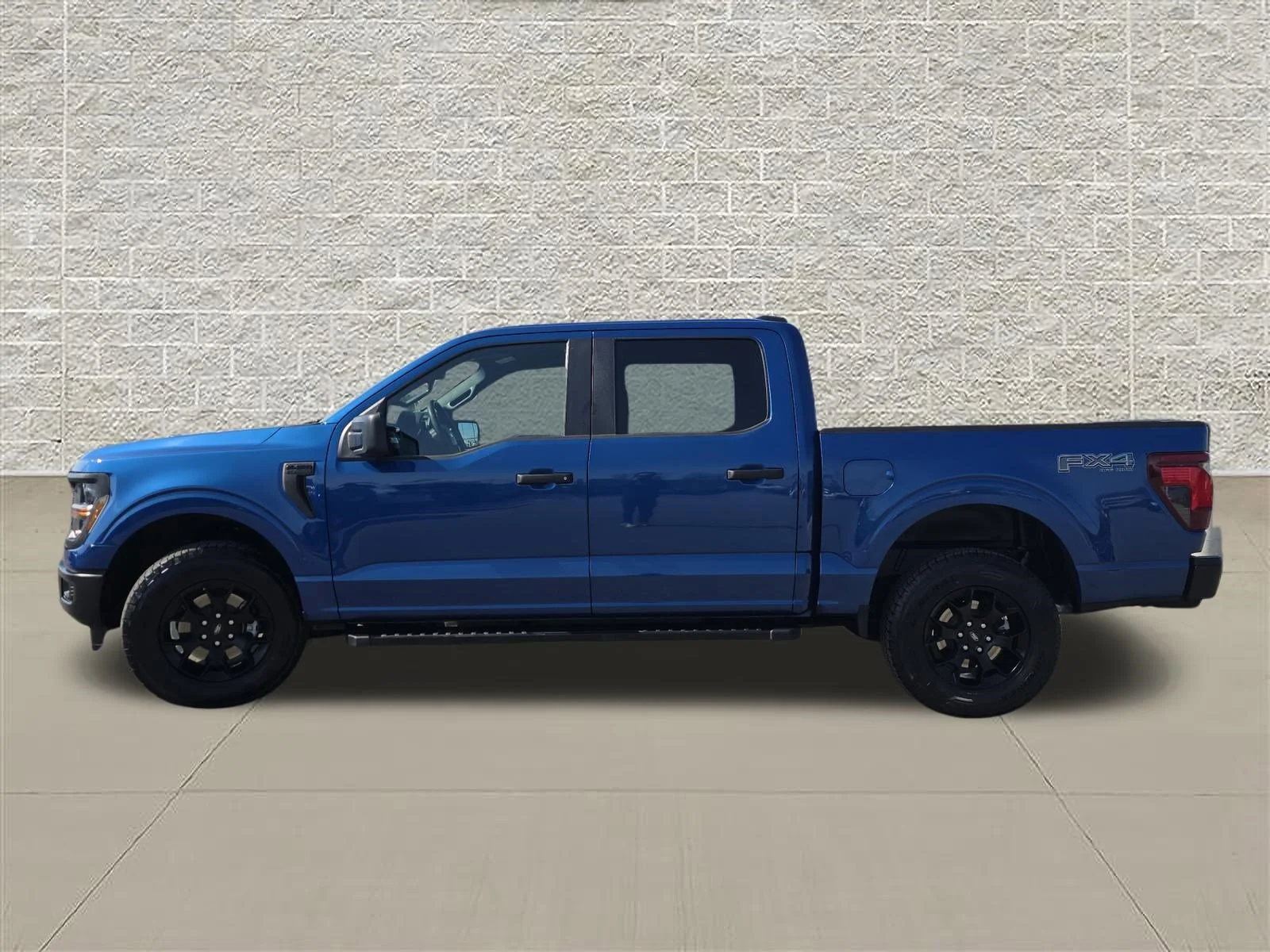 Used 2025 Blue Metallic Ford STX image 4