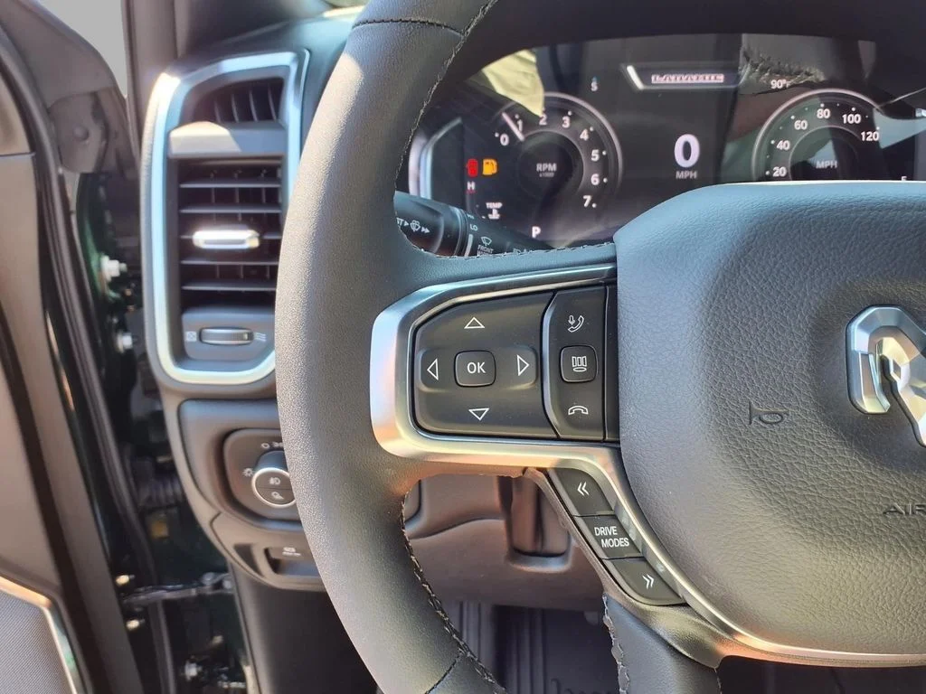 New 2027 Serrano-Green Metallic Exterior Paint RAM Laramie image 9