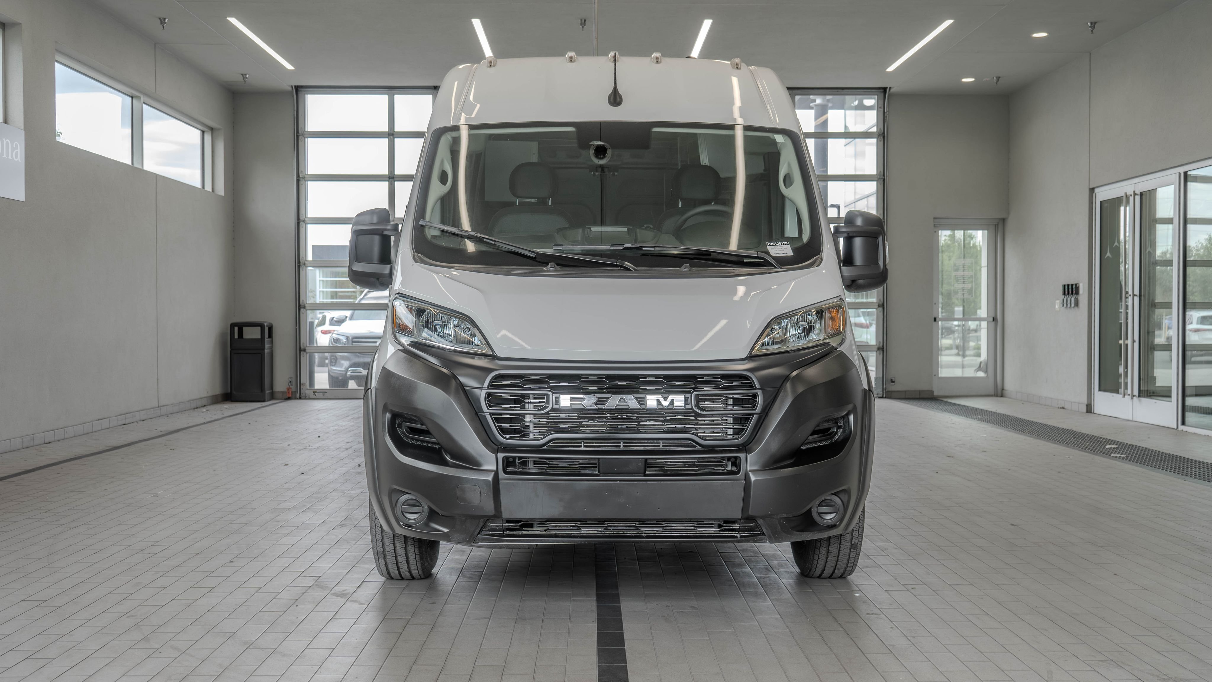 Used 2024 Bright White Clearcoat Ram High Roof image 11