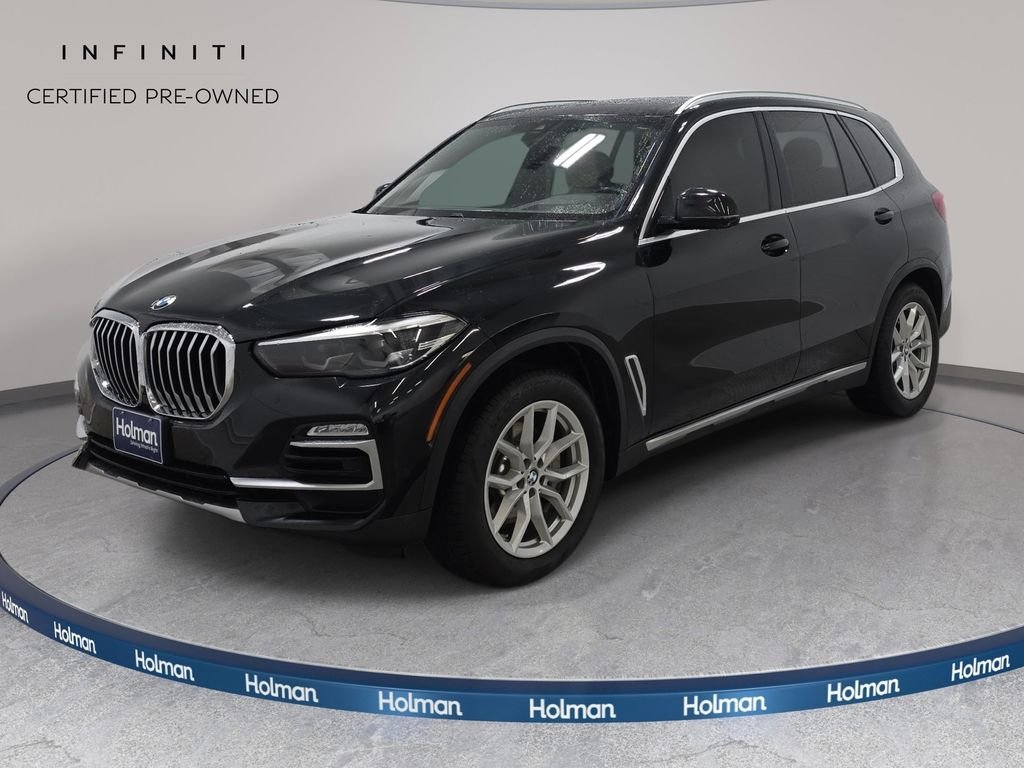 Used 2019 Black Sapphire Metallic BMW xDrive40i image 1
