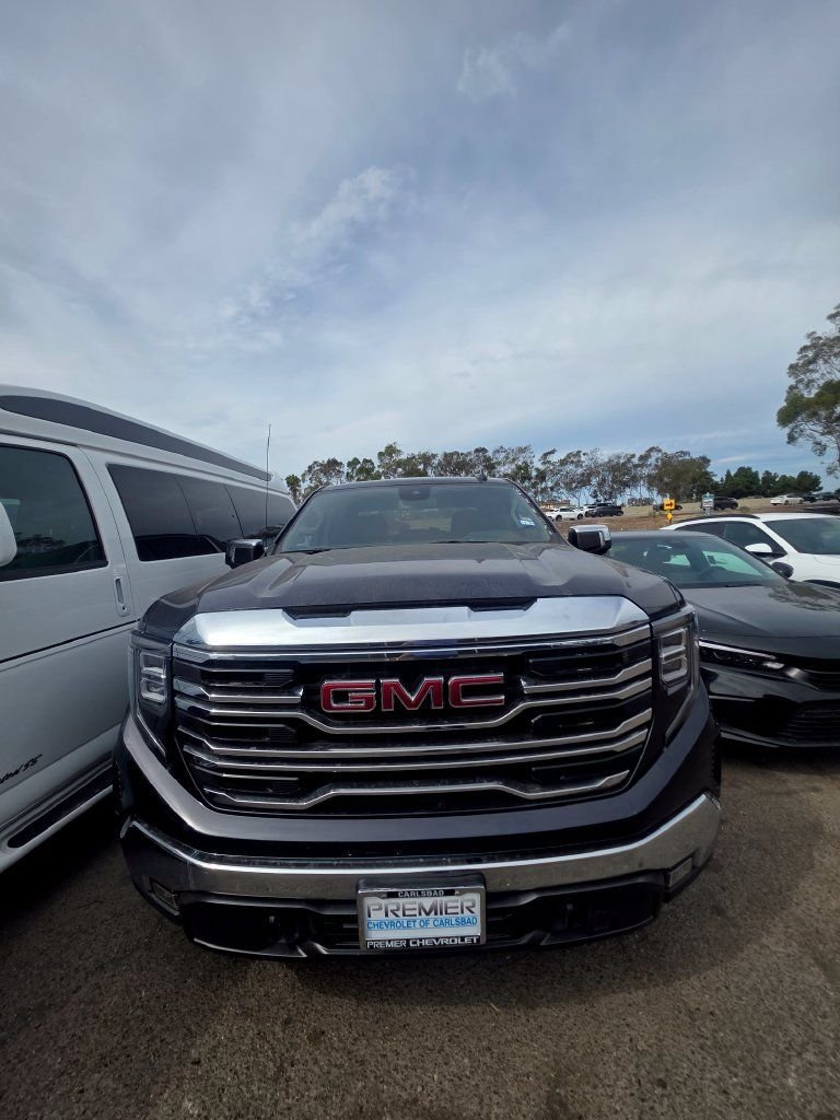 Used 2025 Titanium Rush Metallic GMC SLT image 2