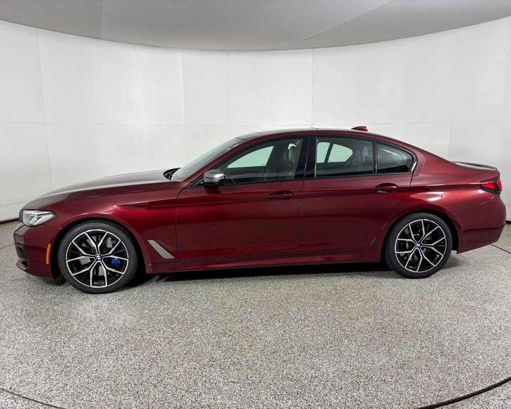 Used 2021 Aventurin Red Metallic BMW M550i xDrive image 6