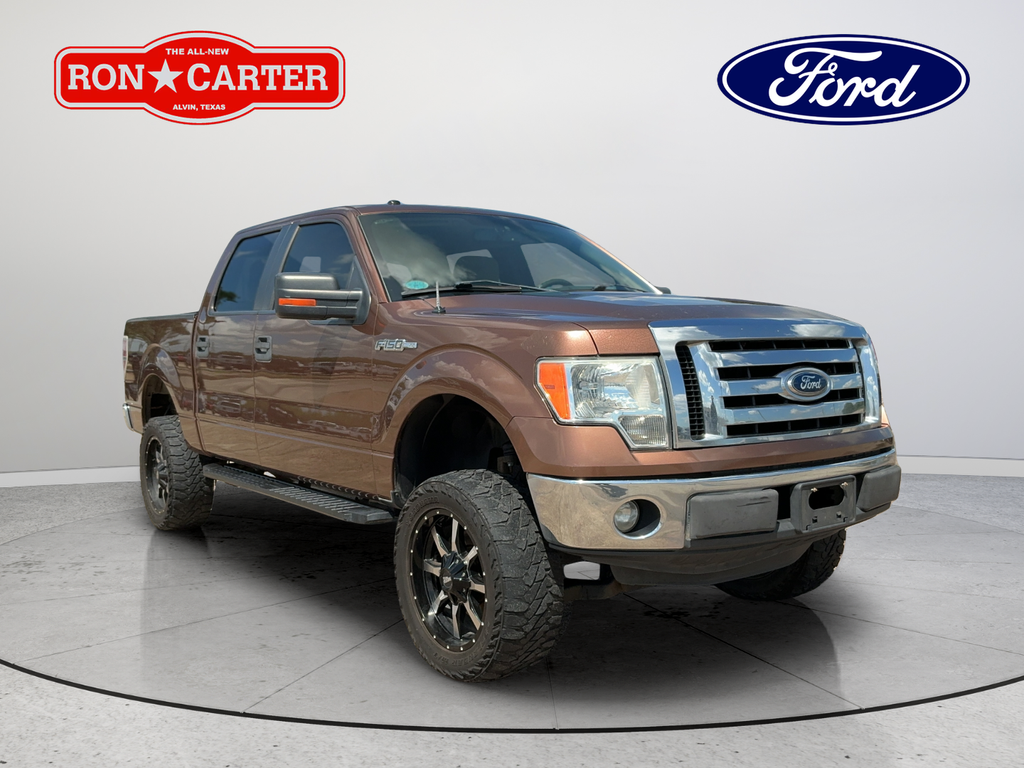 Used 2012 Gold Ford XLT image 1