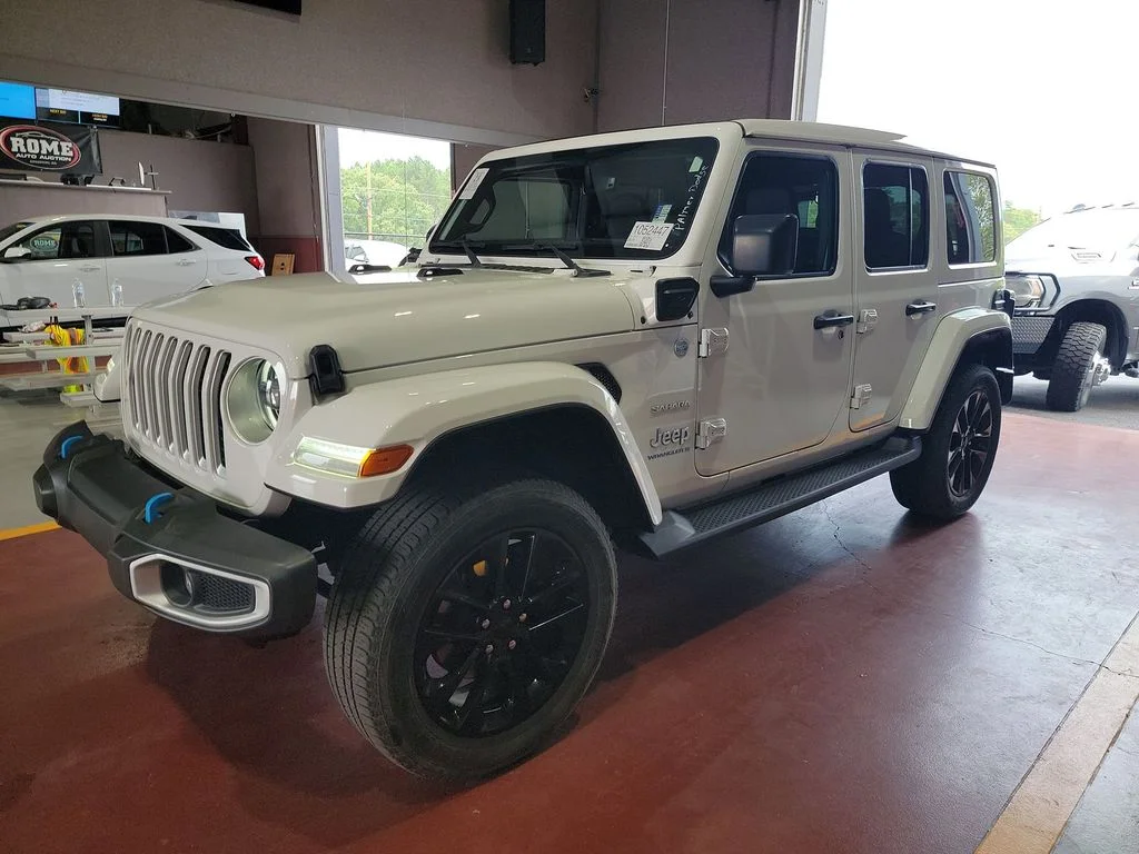 Used 2023 White Jeep Sahara 4xe image 1
