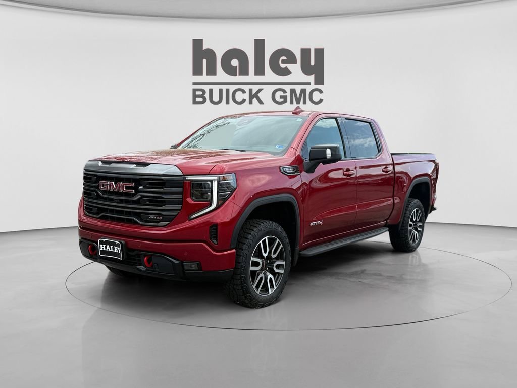Used 2024 Volcanic Red Tintcoat GMC AT4 image 1