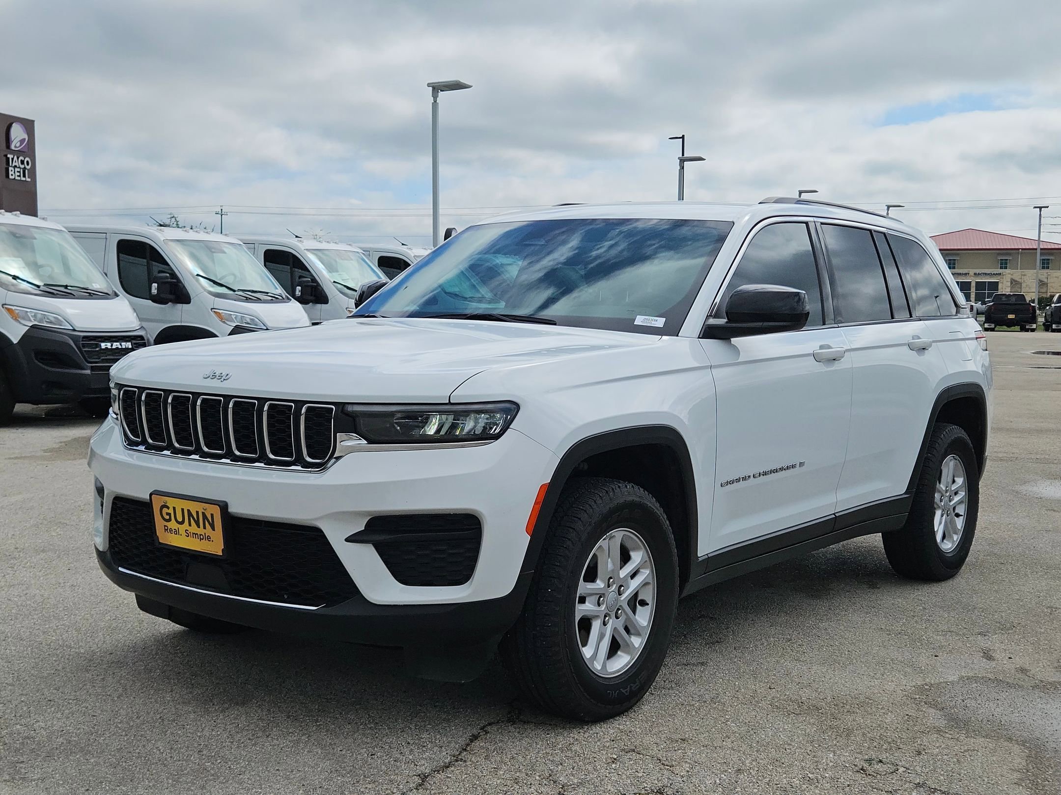 Used 2024 Bright White Clearcoat Jeep Laredo A image 7