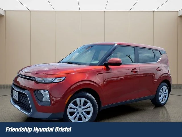 Used 2022 Orange Kia LX image 1