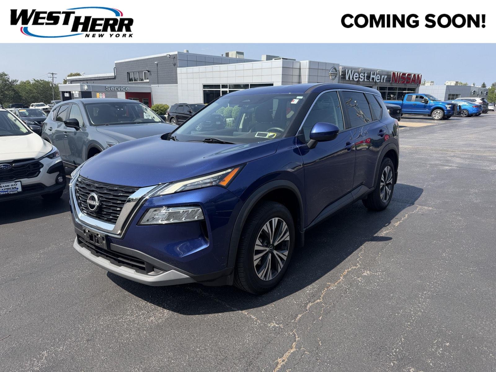 Used 2022 Caspian Blue Metallic Nissan SV image 1