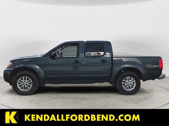 Used 2016 Arctic Blue Nissan SV image 8