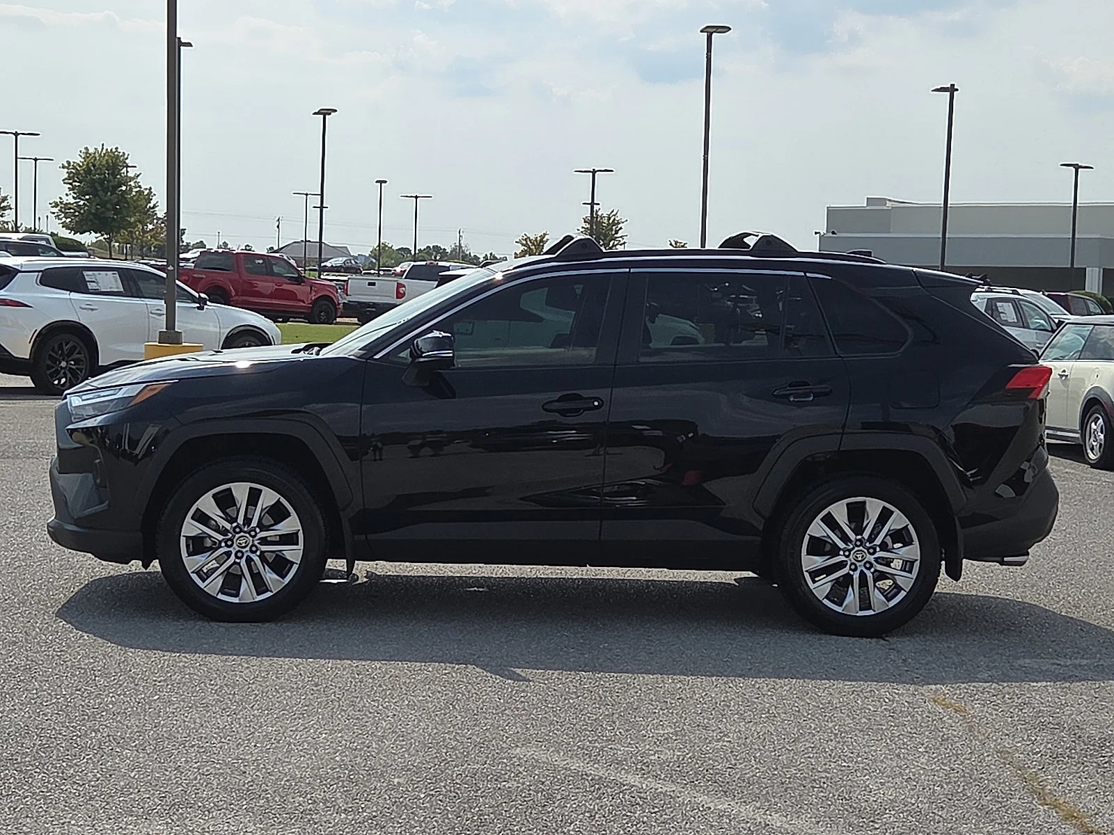Used 2024 Midnight Black Metallic Toyota XLE Premium image 3