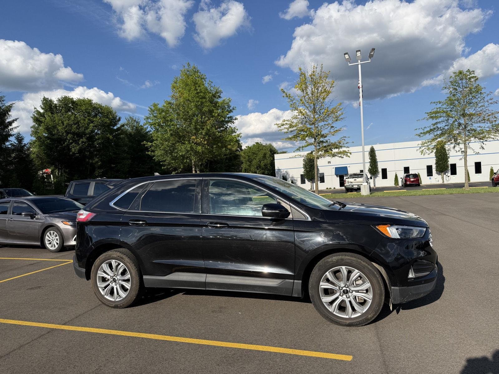 Used 2023 Agate Black Ford Titanium image 4