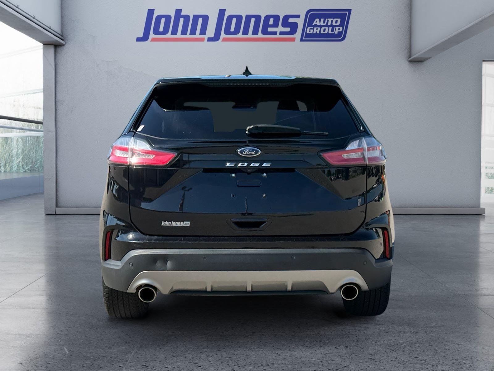 Used 2023 Black Ford Titanium image 4