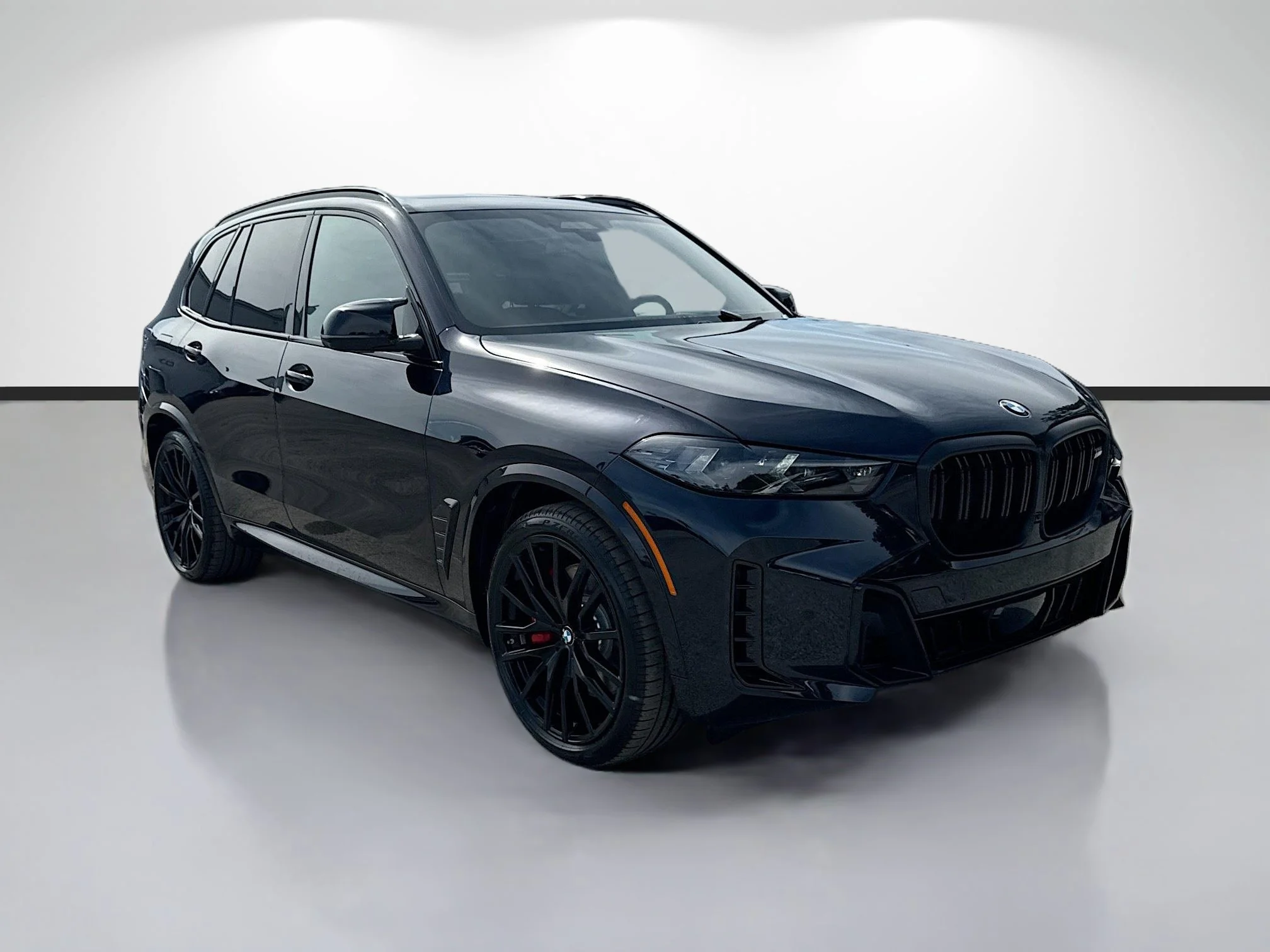 New 2026 Carbon Black Metallic BMW M60i image 1