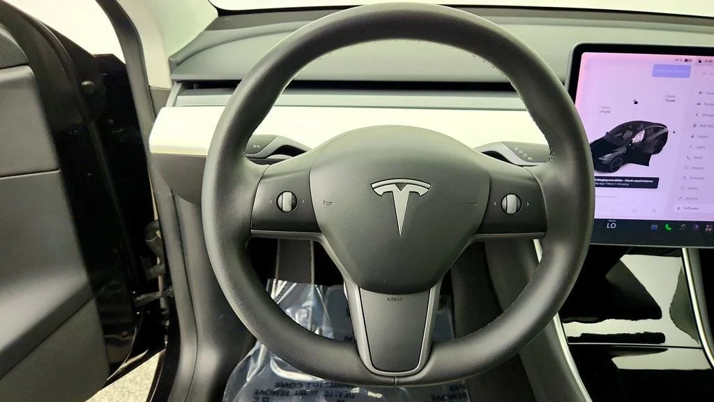 Used 2021 Solid Black Tesla Performance AWD w/ White & Black Premium Interior image 13
