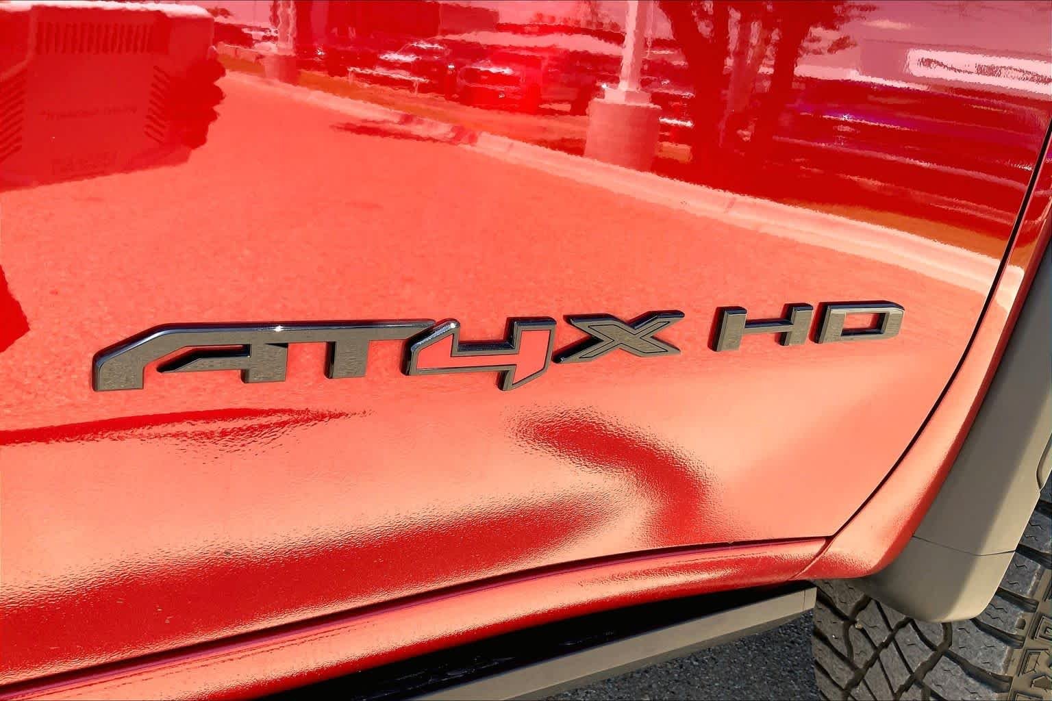 Used 2025 Volcanic Red Tintcoat GMC AT4X image 10