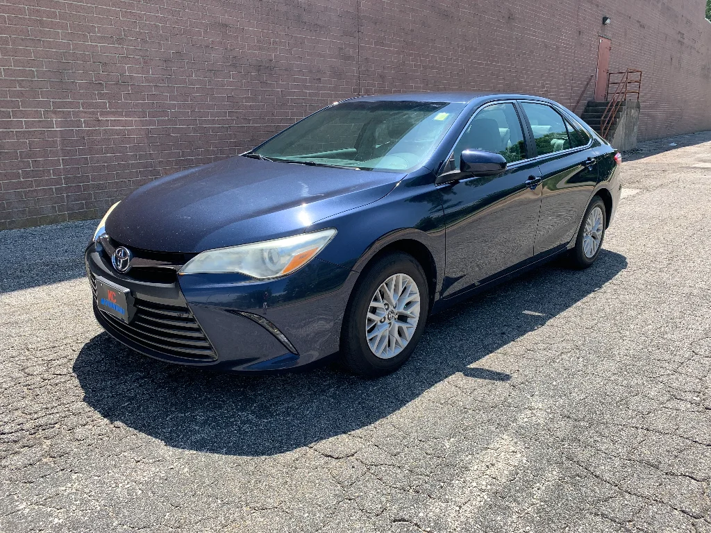 Used 2016 Blue Crush Metallic Toyota LE image 1