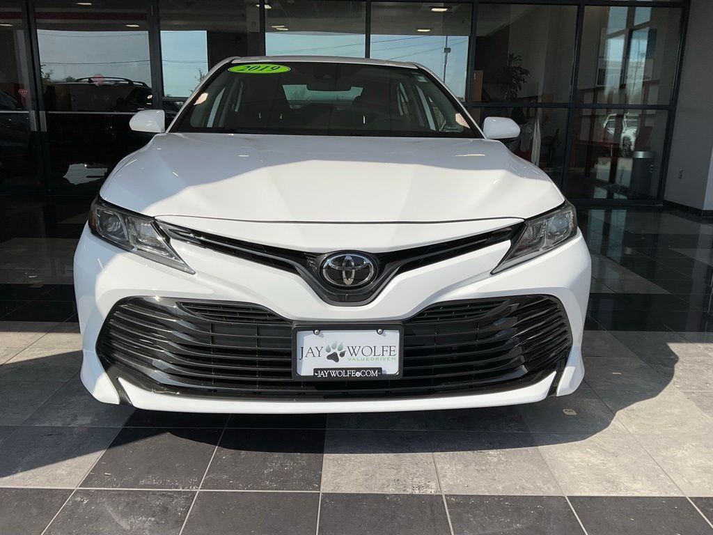 Used 2019 White Toyota LE image 2