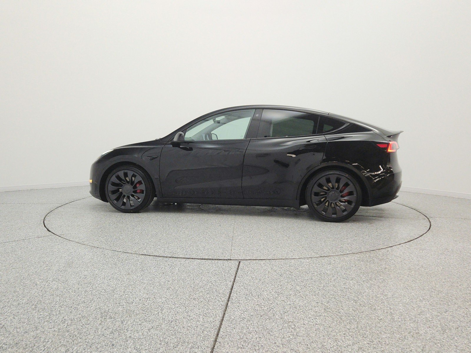 Used 2022 Solid Black Tesla Performance AWD image 8
