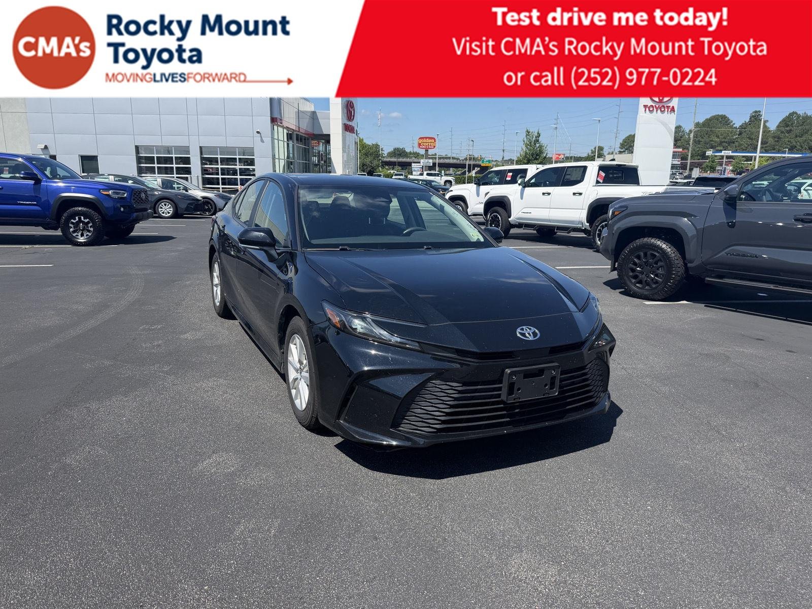 Used 2025 Midnight Black Metallic Toyota LE image 1