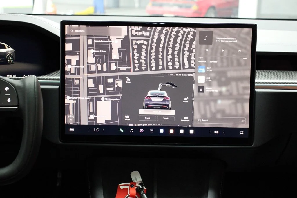 Used 2022 Solid Black Tesla Plaid image 43