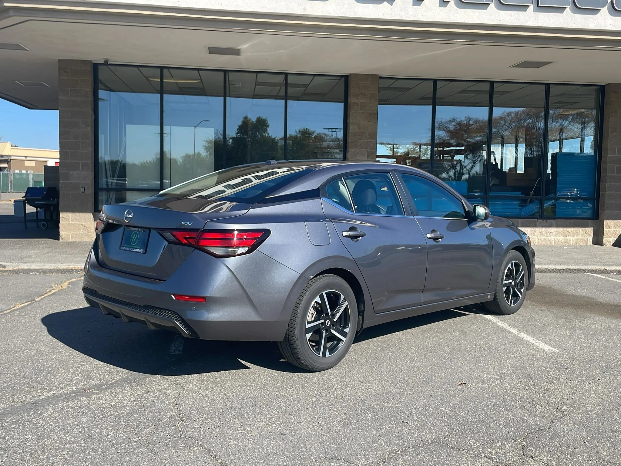 Used 2024 Gun Metallic Nissan SV image 7