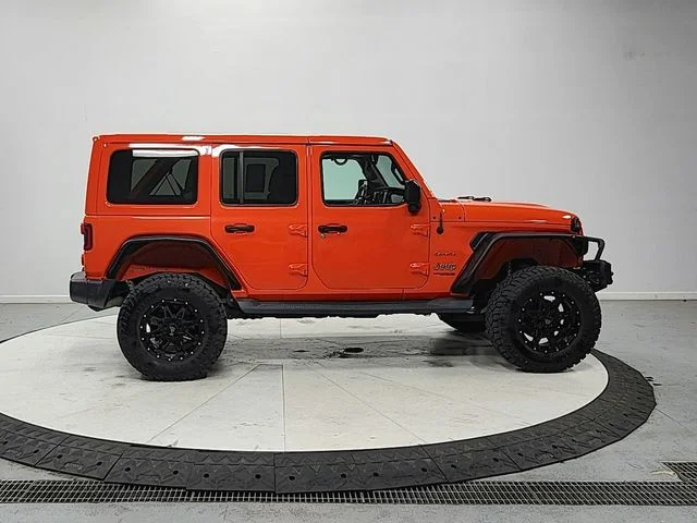 Used 2018 Orange Jeep Unlimited Sahara image 8