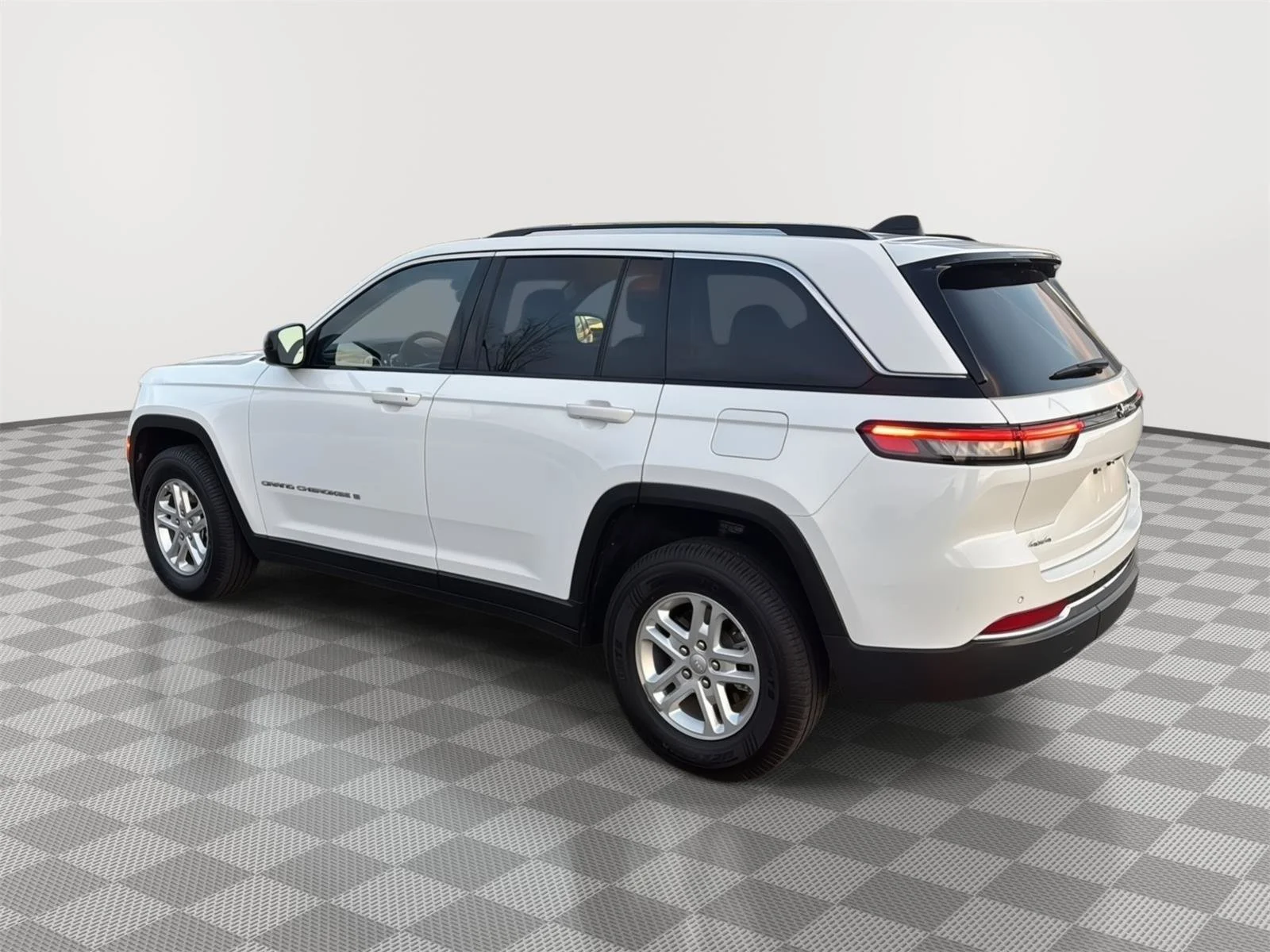 Used 2023 Bright White Clearcoat Jeep Laredo image 5
