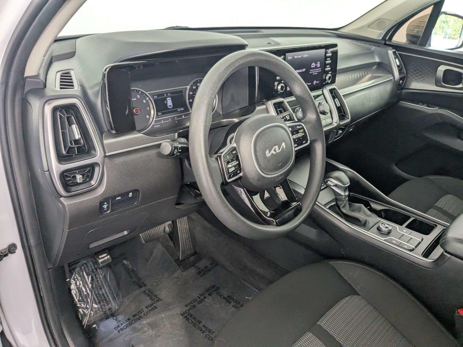 Used 2023 Glacial White Pearl Kia LX image 12