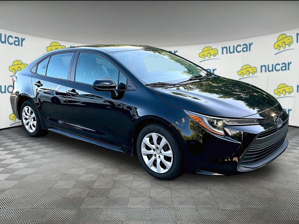 Used 2025 Black Toyota LE image 1