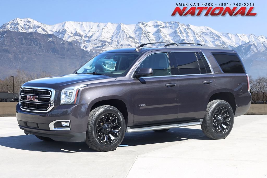 Used 2015 Iridium Metallic GMC SLT image 1