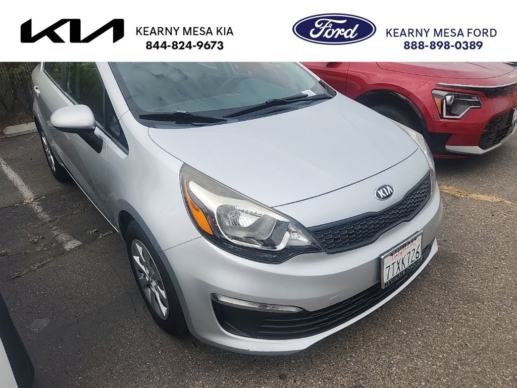 Used 2016 Bright Silver Metallic Kia LX image 1