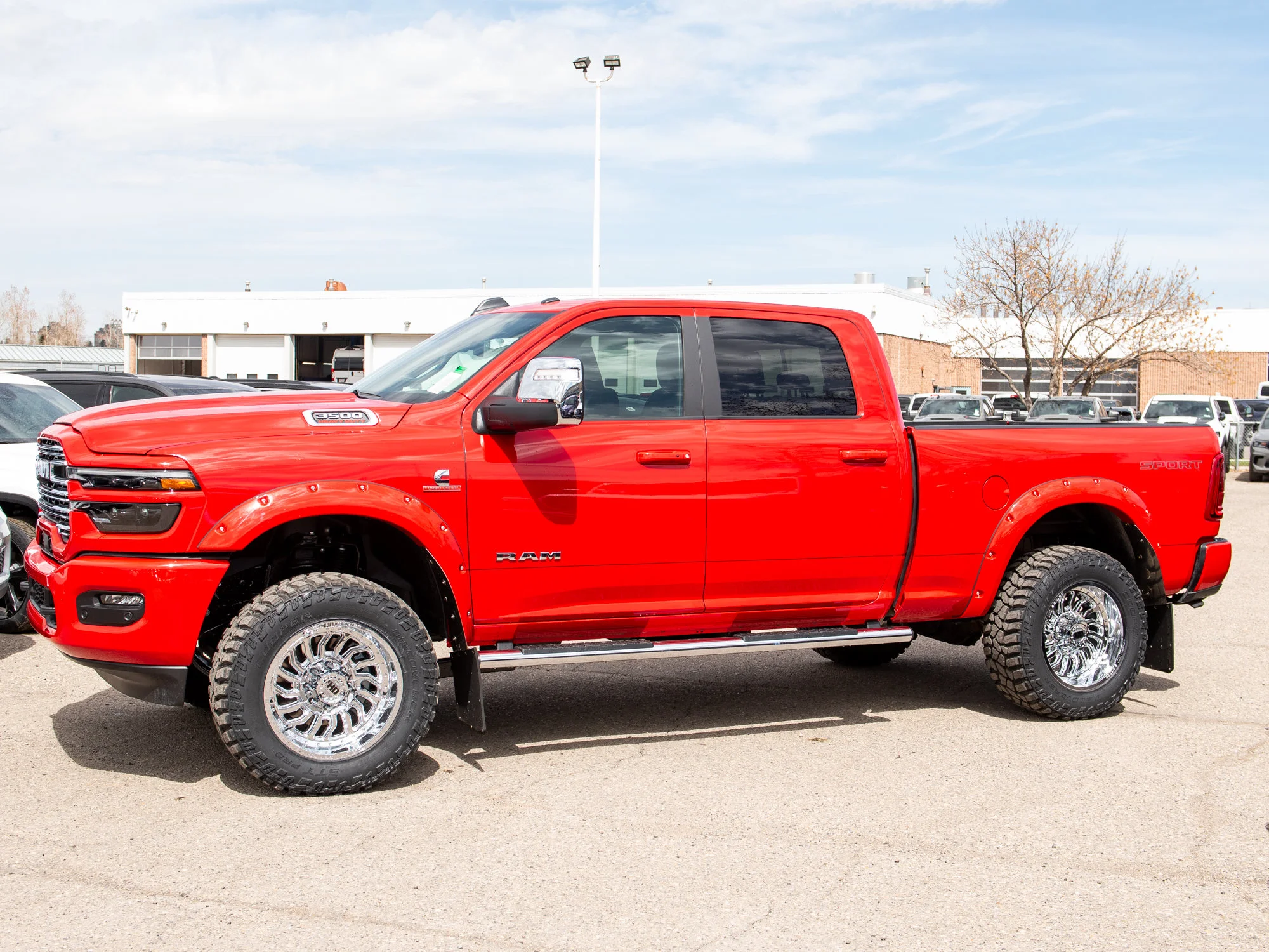 Used 2026 Red RAM Laramie*, 2 Inch Lift, 20 Inch Chrome Wheels, 35 Inch Tires, Trigger Industries MudFlaps image 6