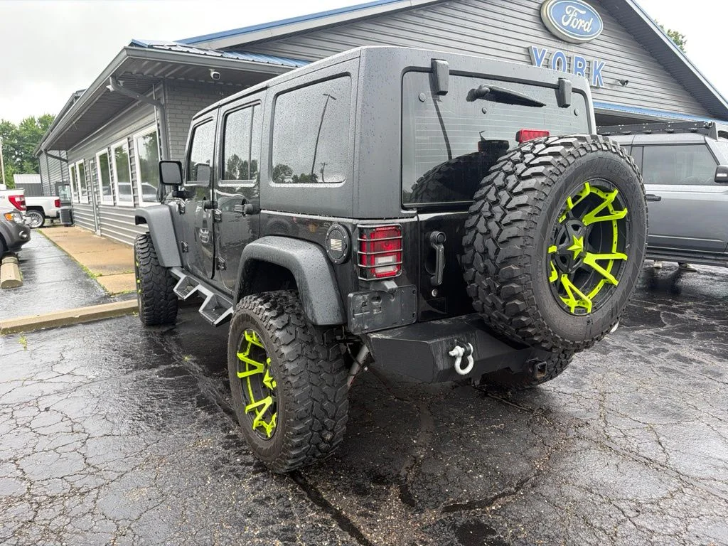 Used 2017 Black Jeep Unlimited Sport image 3