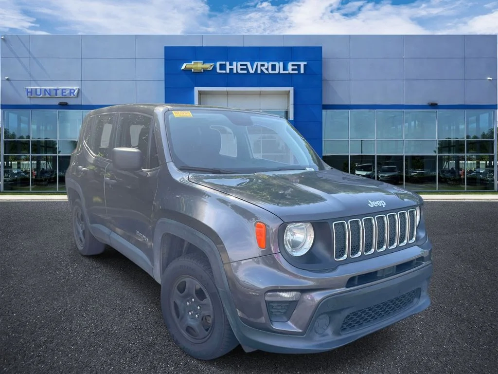 Used 2019 Granite Crystal Metallic Clearcoat Jeep Sport image 1