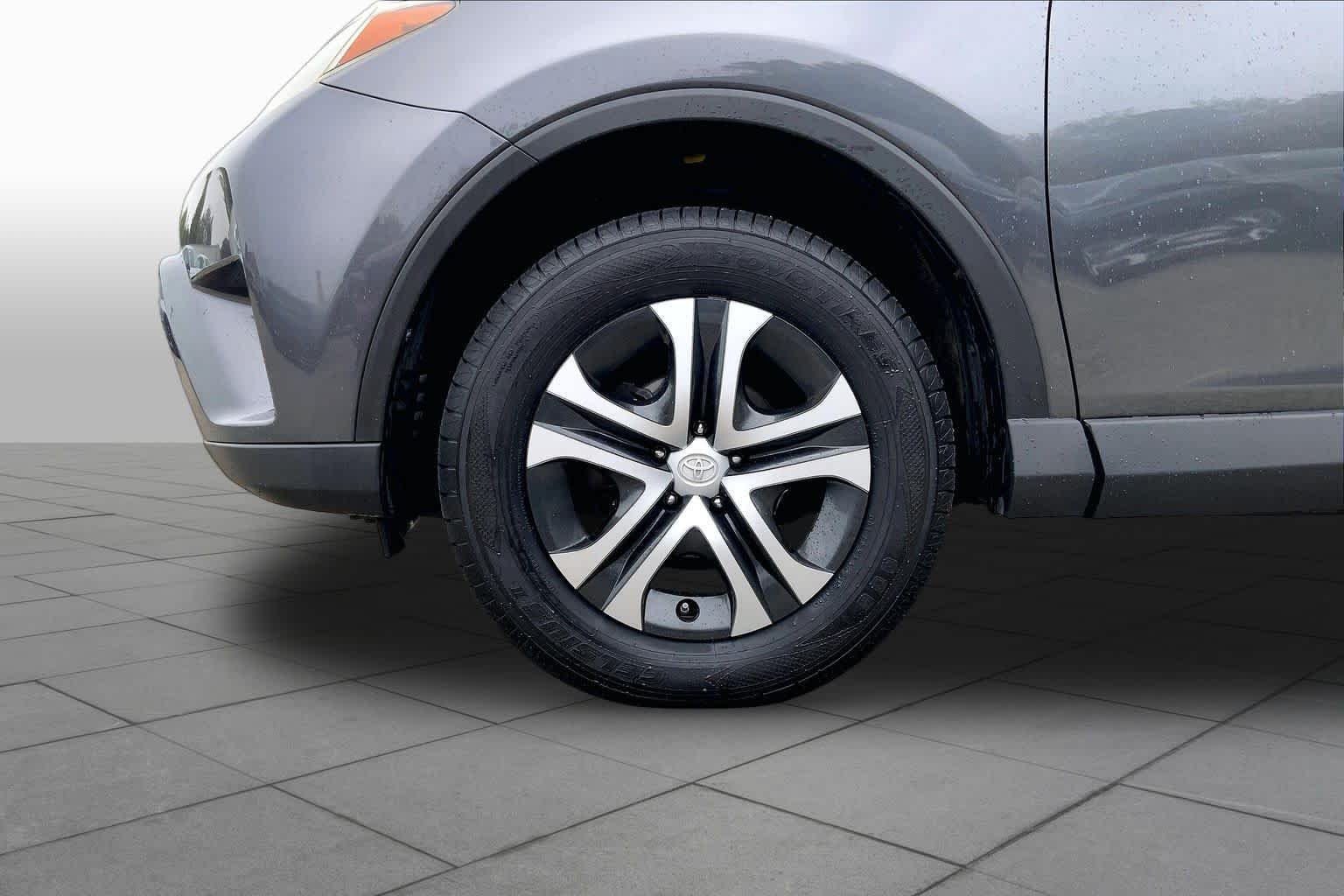 Used 2016 Magnetic Gray Metallic Toyota LE image 11