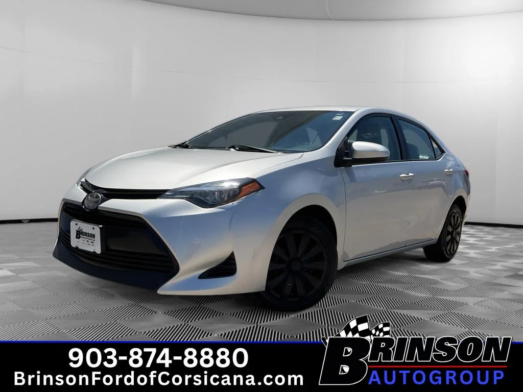 Used 2018 Classic Silver Metallic Toyota LE image 1