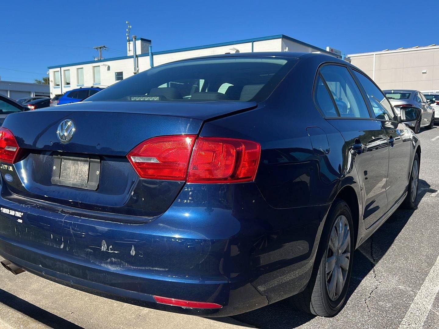 Used 2012 Tempest Blue Metallic Volkswagen S w/Sunroof image 5