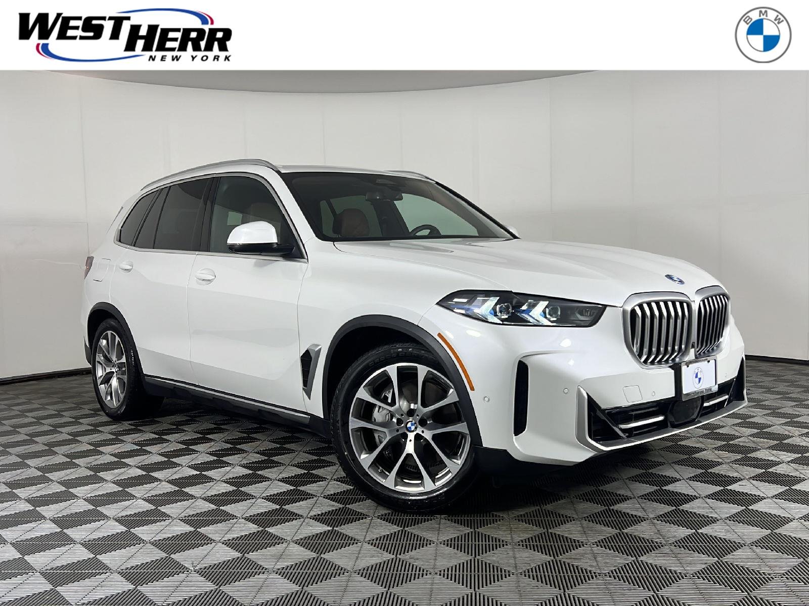 New 2026 Mineral White Metallic BMW xDrive50e image 1