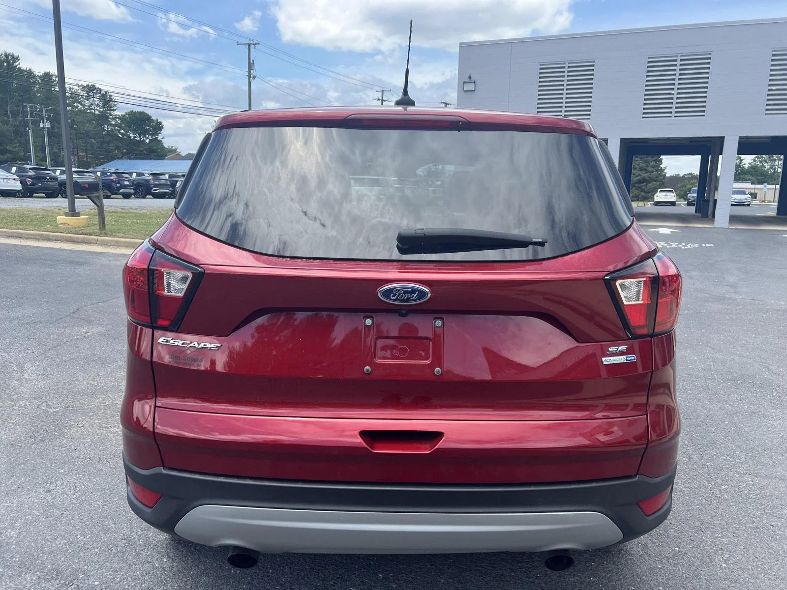 Used 2019 Ruby Red Metallic Tinted Clearcoat FORD SE 4WD image 4
