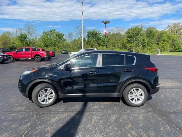 Used 2019 Kia Sportage LX with VIN KNDPMCAC5K7606823 for sale in North Canton, OH