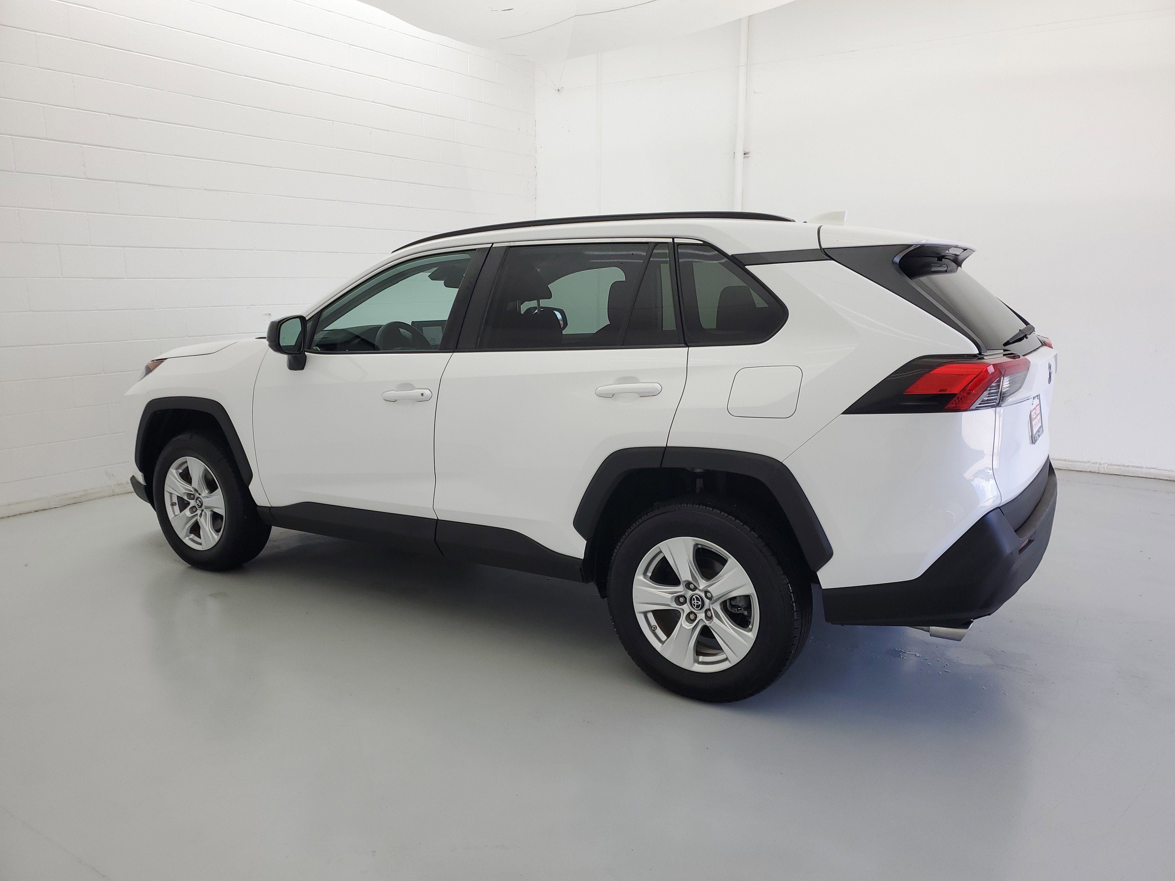 Used 2021 Super White Toyota LE image 7