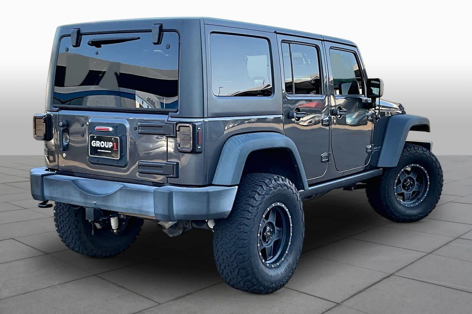 Used 2016 Granite Crystal Metallic Clearcoat Jeep Rubicon image 13