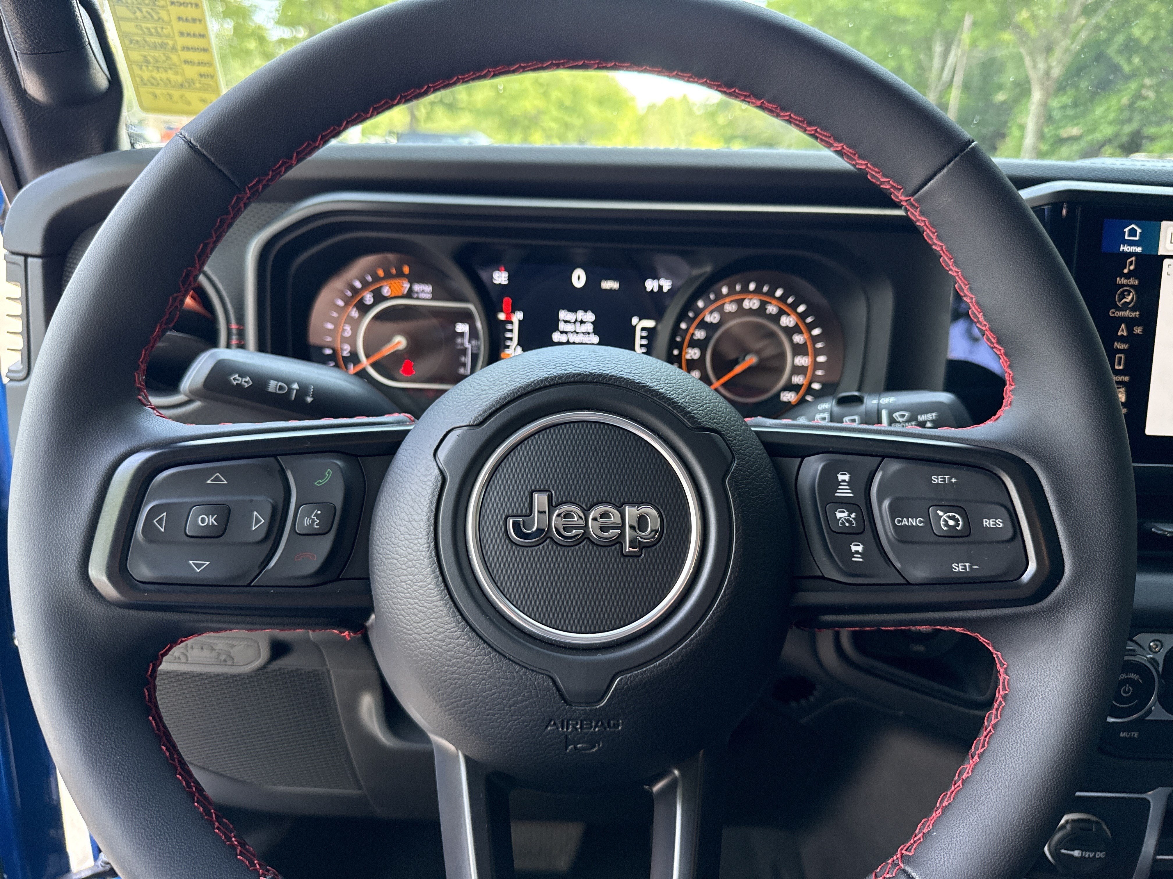 Used 2024 Hydro Blue Pearlcoat Jeep Rubicon X image 25