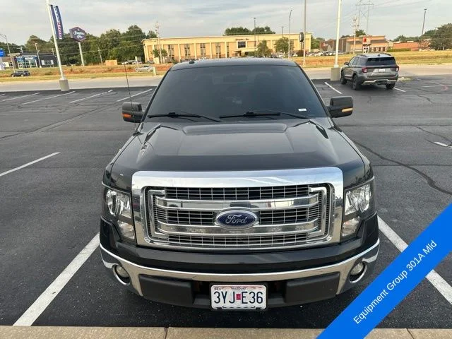 Used 2013 Tuxedo Black Metallic Ford XLT image 2
