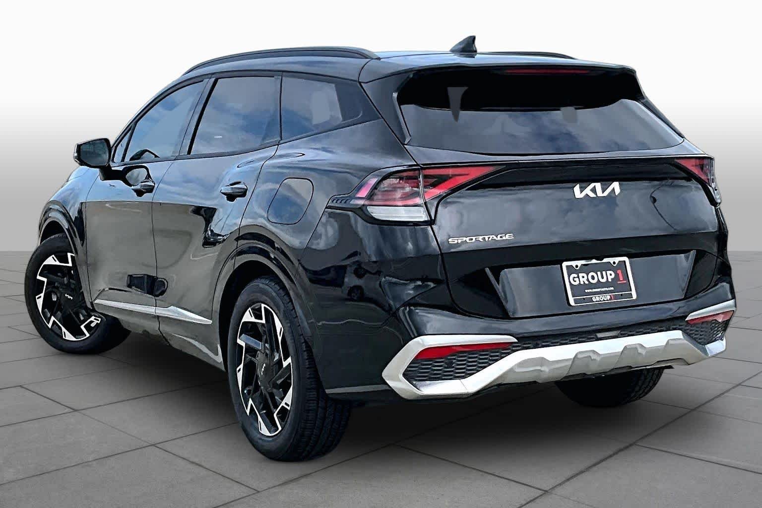 Used 2023 Ebony Black Kia SX-Prestige image 11