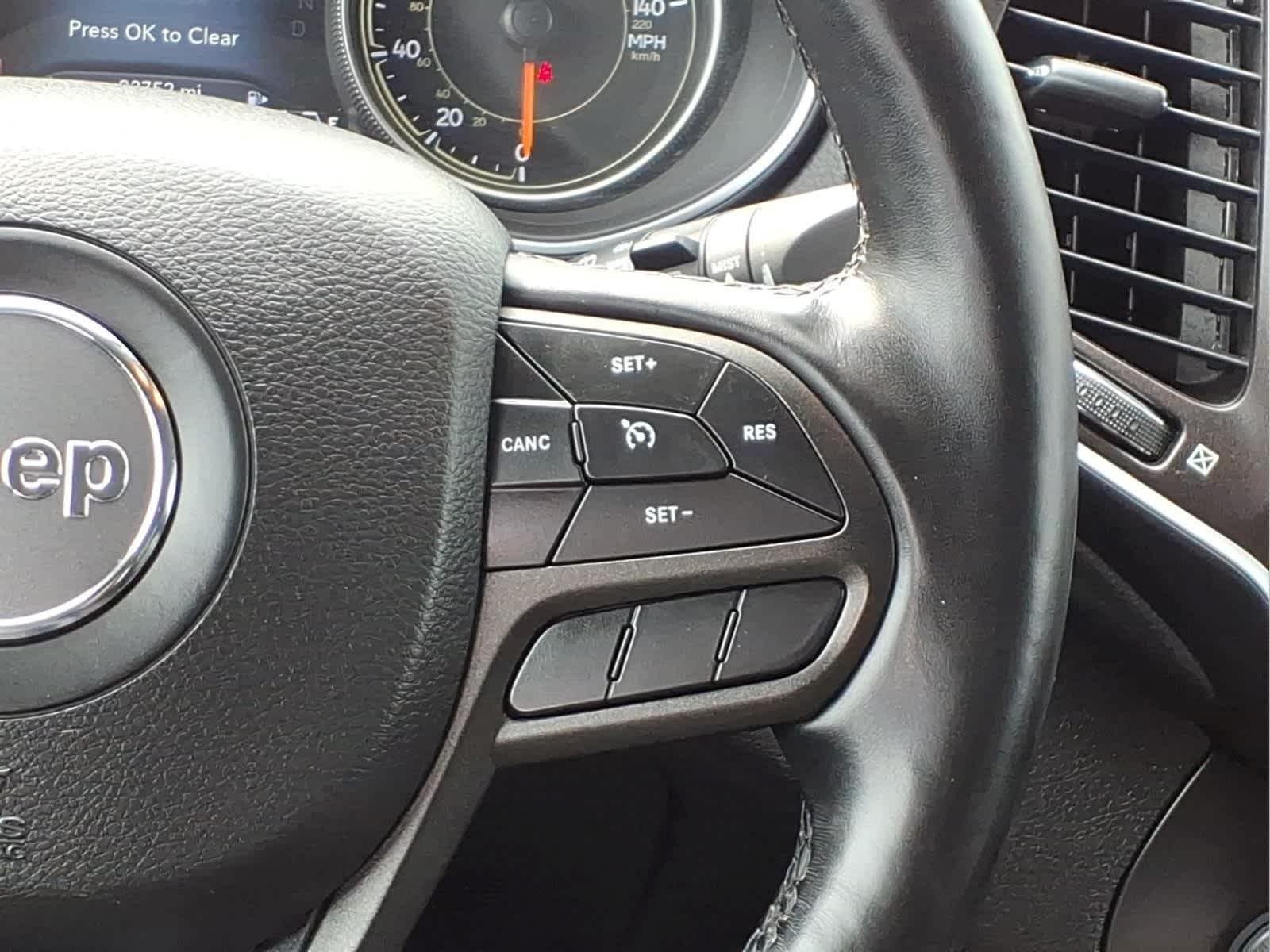 Used 2021 Olive Green Pearlcoat Jeep Trailhawk image 22