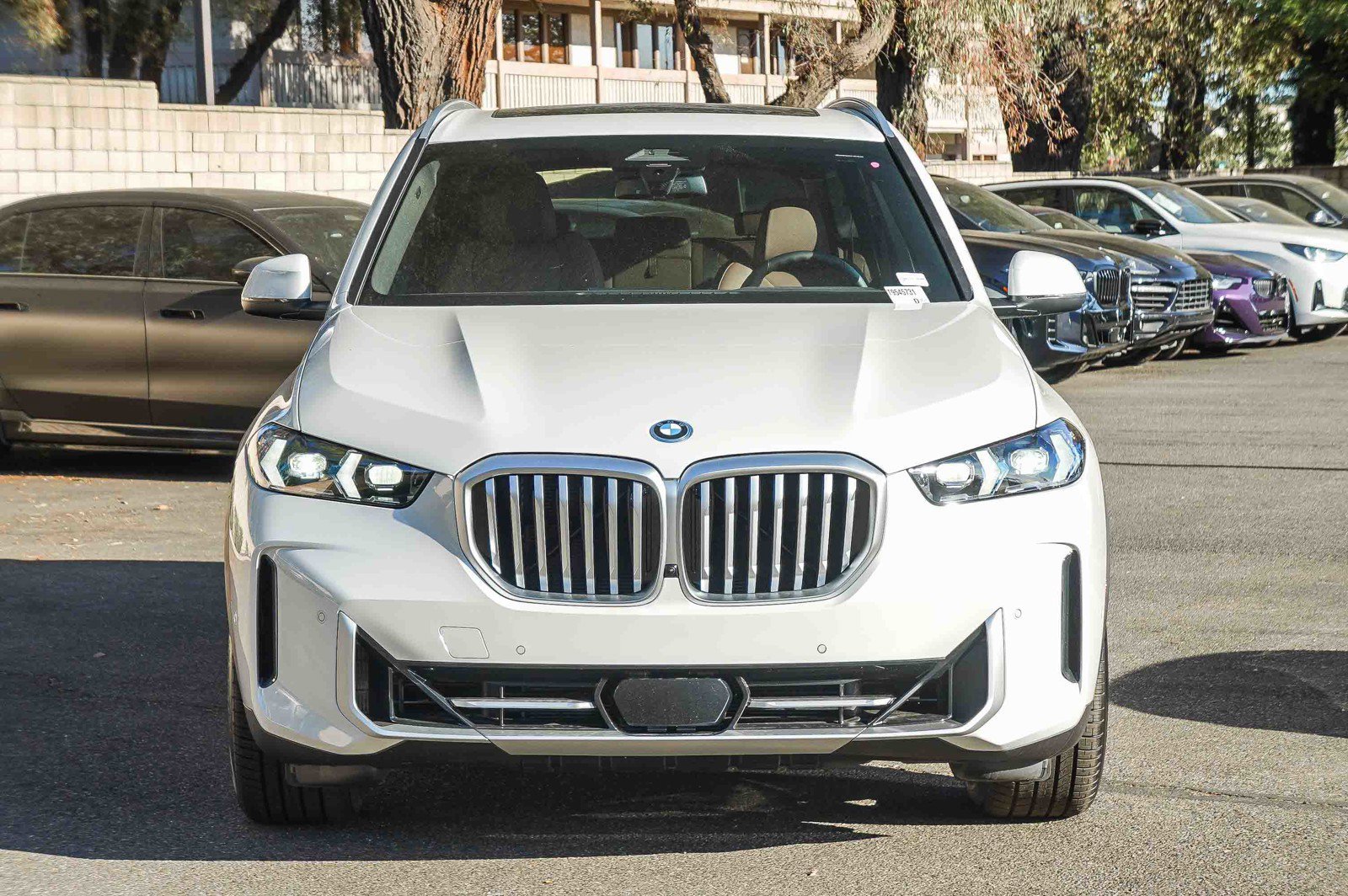 New 2026 Mineral White Metallic BMW xDrive50e image 2