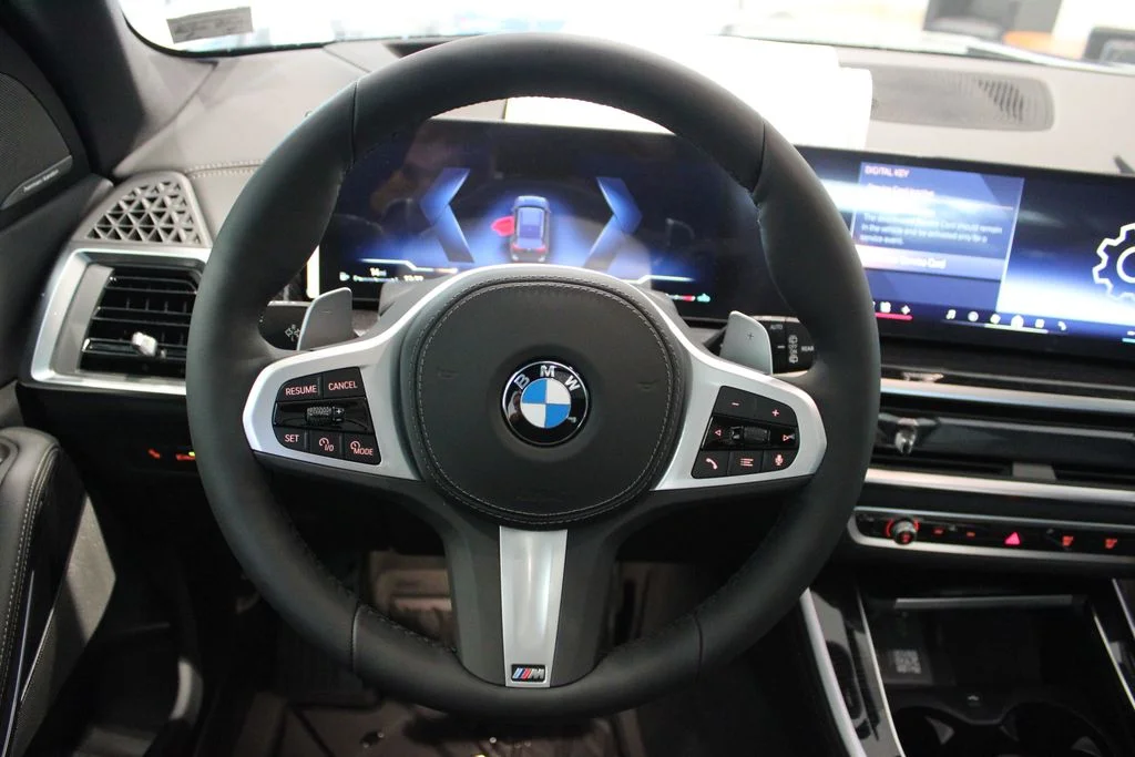 New 2026 Black Sapphire Metallic BMW xDrive40i image 21